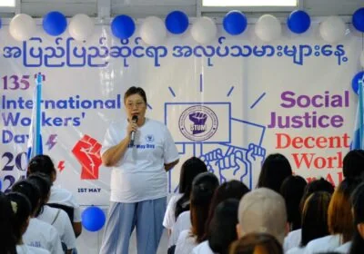 Myo Myo speaking on International Labour Day in 2025